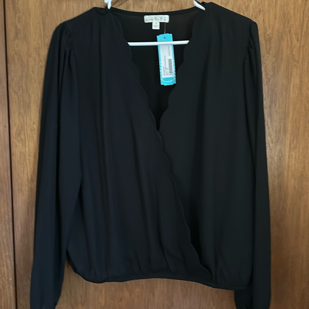 Classy, scalloped detail, black blouse